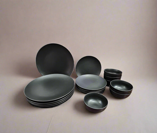 18-piece black ceramic matte finish dinnerware set with plates and bowls