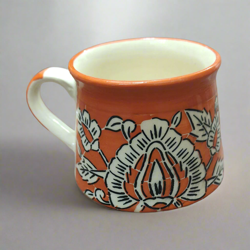 Ceramic cup mughal design , orange color, very fine or household